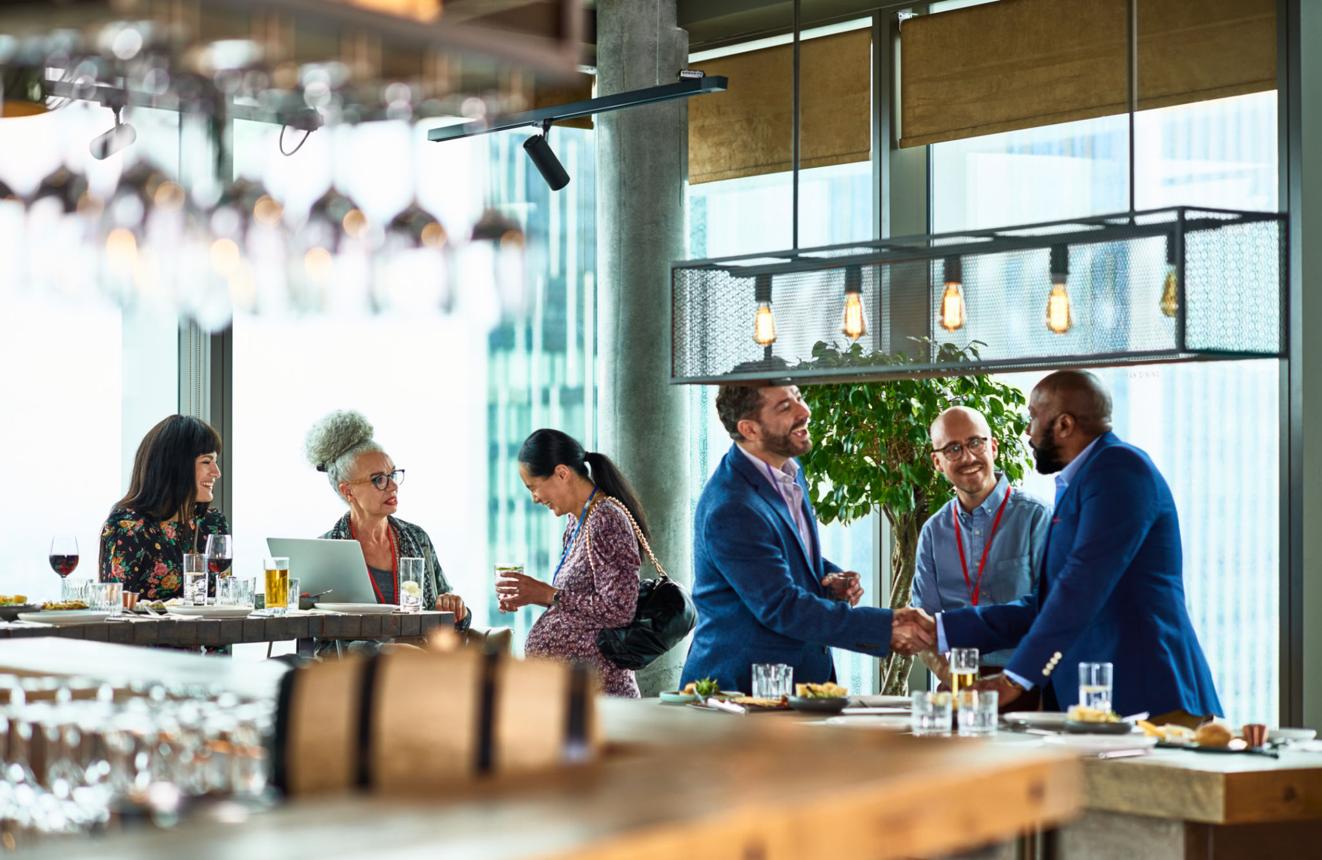 Event planners and travel directors connecting at a networking event